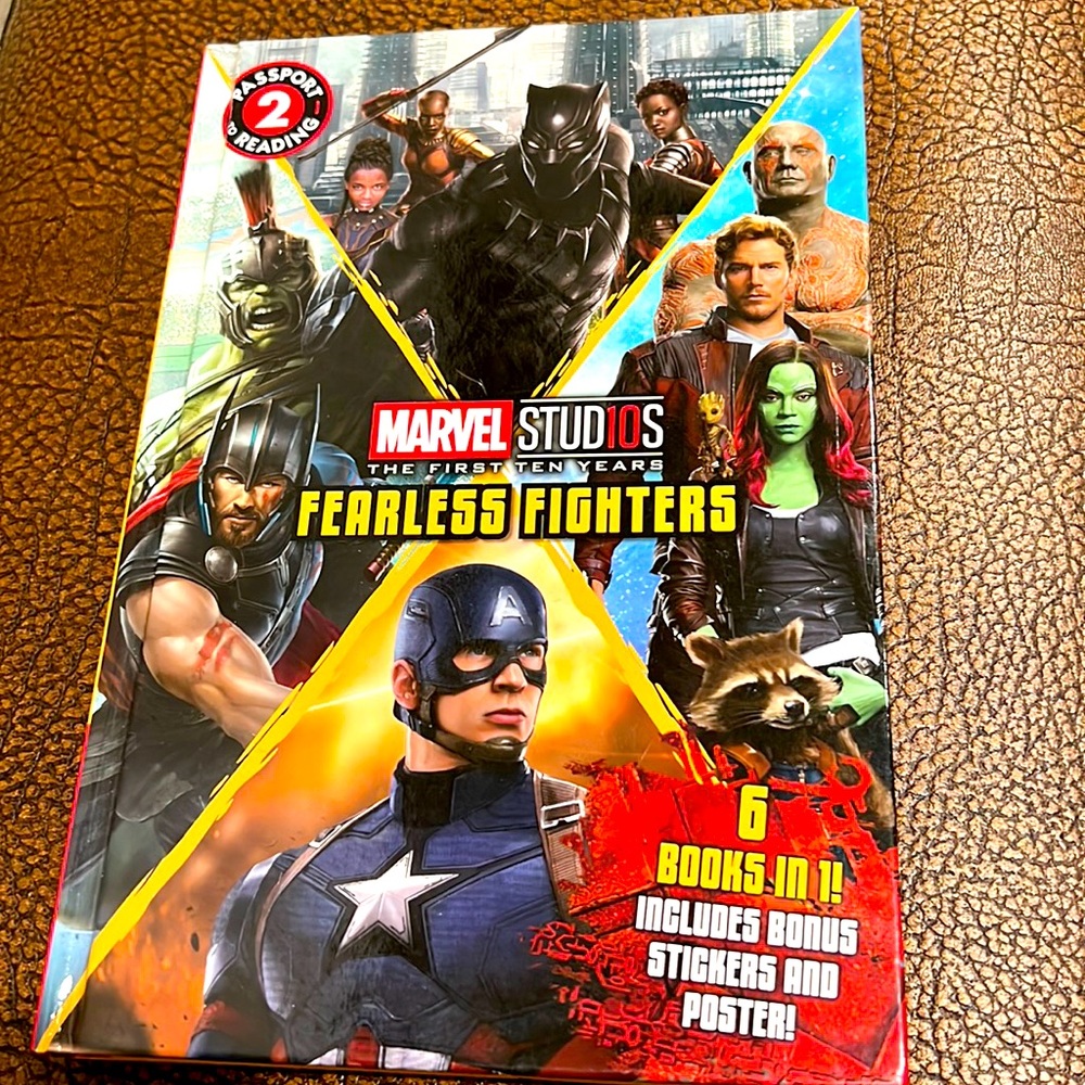 Marvel Studios The First Ten Years Fearless Fighters Hardcover Book is like new